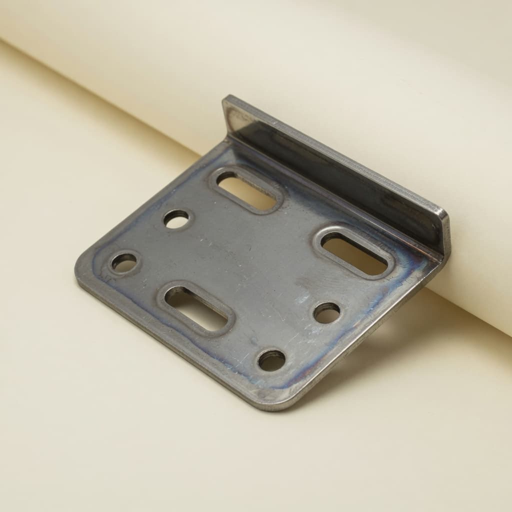 Formed steel latch plate with slotted holes.
